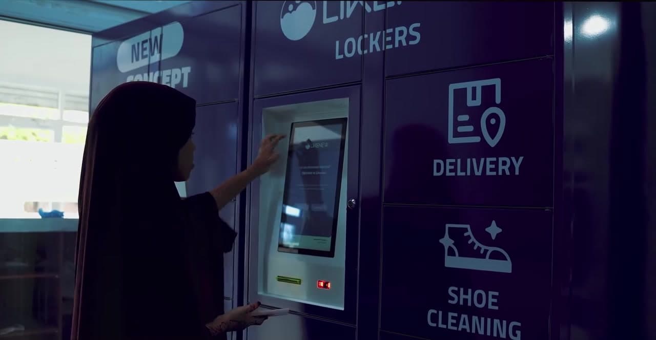 A customer using a LikeNew smart locker