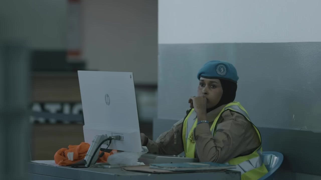 An aviation security officer at her post