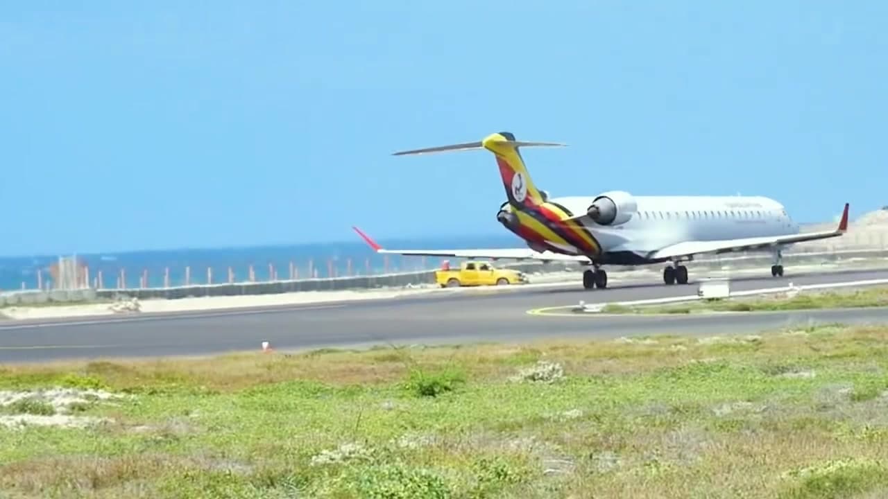 An aircraft landing at Aden Adde International Airport